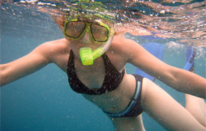 Girl snorkeling at Kiahuna Plantation